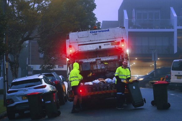 A truck collecting residential waste along Macauley Street in Leichhardt. 