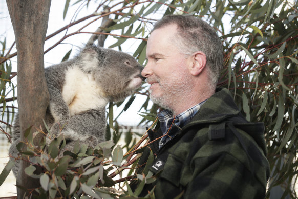 James Fitzgerald from Two Thumbs Wildlife Trust with Paul the Koala, named after First Officer Paul Hudson, one of the American firefighters who died in a plane crash while protecting the property.