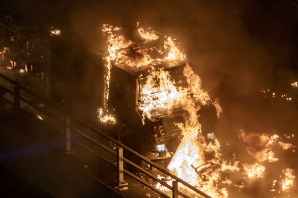 A police vehicle on fire near Hong Kong Polytechnic University on Sunday evening.