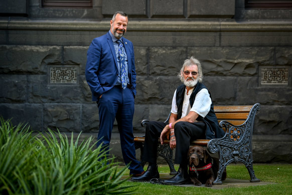 MP Stuart Grimley (left), of Derryn Hinch’s Justice Party, campaigning earlier this year for veterans to get trauma dogs with the late Ron Fenton and his trauma dog, Yogi.