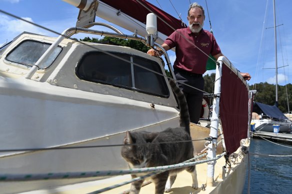 Robert Williams and his cat Oli are part of the crew sailing Sylph VI to Hobart.