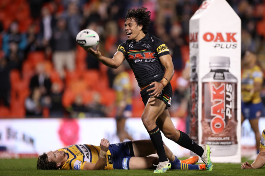 Panthers five-eighth Jarome Luai celebrates his try against the Eels on Friday night.