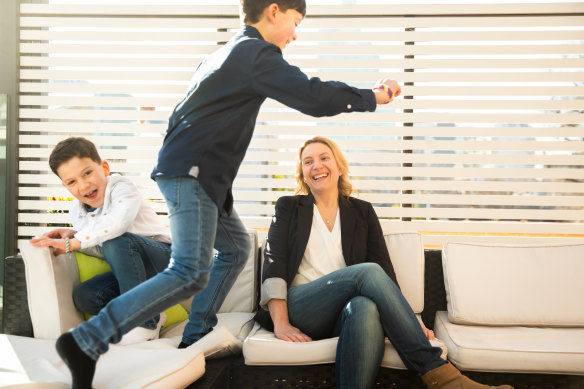 Debra Filippin, with her sons Isaac (left) and August, draws on her own experience with post-natal anxiety to support a new mother though a peer-to-peer program run by the Royal Women's Hospital.