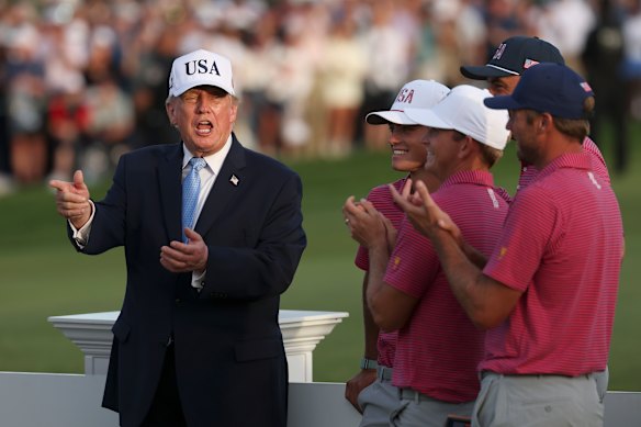 Trump, an avid golfer, at the awards ceremony for the Presidents Cup golfing tournament in Illinois in September.