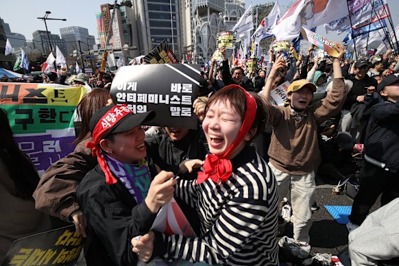 Protesters opposed to Yoon erupted into tears and danced when the verdict was announced.