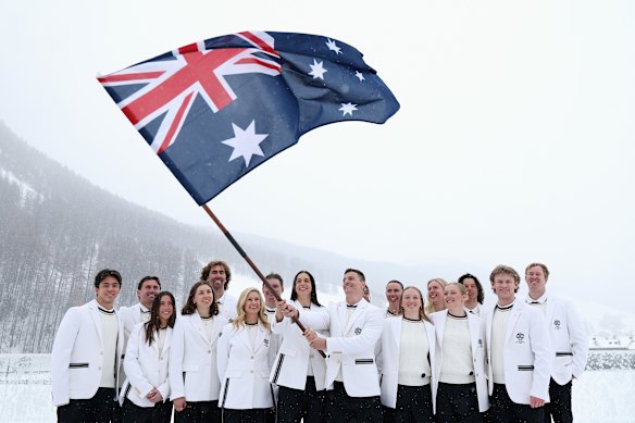 Milano Cortina 2026 Winter Olympics Australian flag bearers Jakara Anthony and Matt Graham pose with Australian team Chef de Mission and Alisa Camplin and Australian athletes.