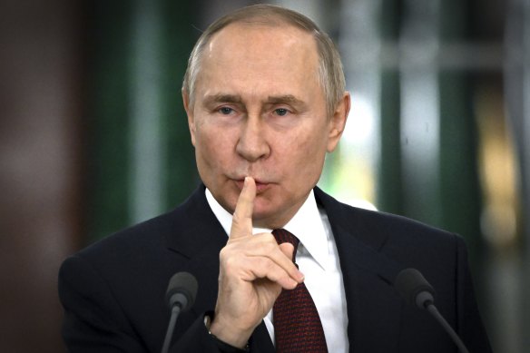 Hear no evil? Russian President Vladimir Putin  