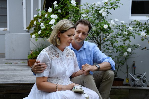Joe Massa’s heartbroken parents Elouise and Danny holding a pair of his shoes. 