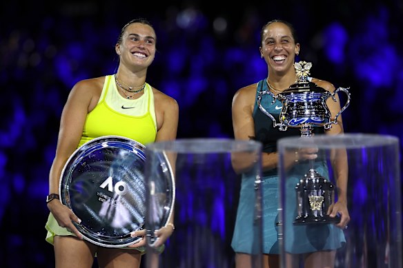 Aryna Sabalenka on court last year with her runners-up plate alongside triumphant American Madison Keys.