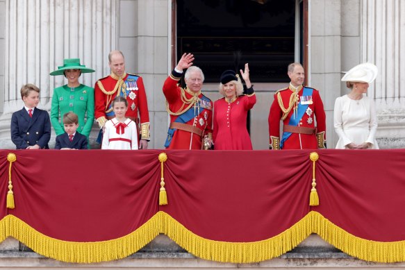 King Charles III and Queen Camilla with their family at Buckingham Palace last year.