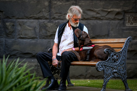 Yogi, with ex-cop Ron Fenton.