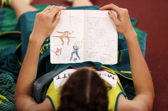 Nicola Olyslagers reads her notebook during the competition at the Tokyo Olympics, where she claimed silver.