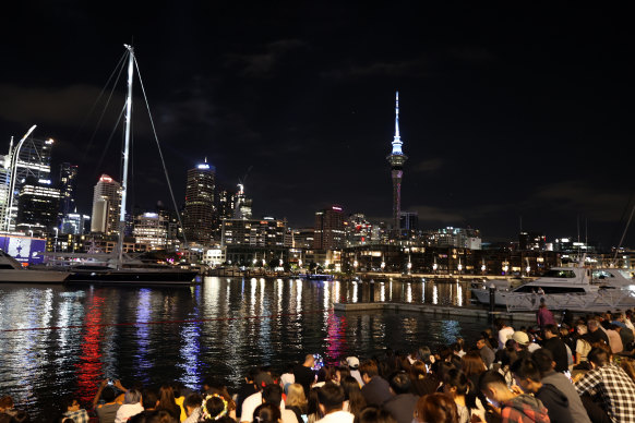 Crowds – yes, crowds – wait for the fireworks to start in Auckland.