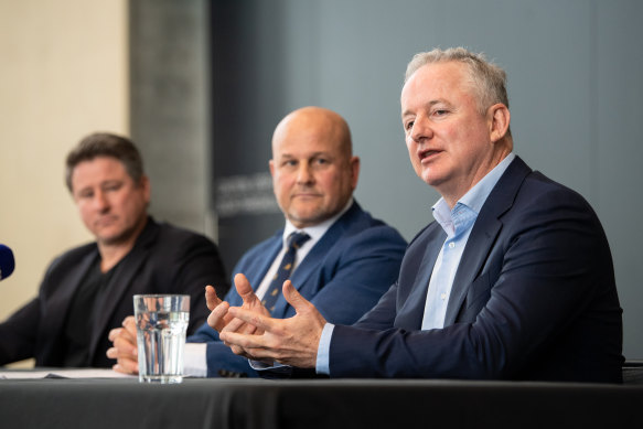 Hugh Marks (right) with Stan chief Mike Sneesby and interim Rugby Australia CEO Rob Clarke at the announcement of the Stan Sport deal with Rugby Australia.