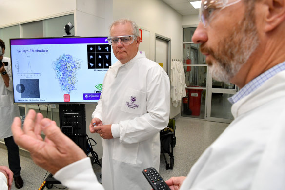 Then-prime minister Scott Morrison tours the University of Queensland’s Vaccine Lab in  October 2020.