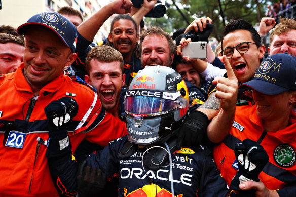 Sergio Perez celebrates with his Red Bull teammates after winning the Monaco Grand Prix on Sunday.