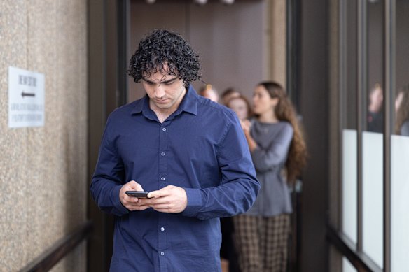 Carlo Boumouglbay, Charlotte MacInnes’ boyfriend, leaves the Federal Court on Wednesday.