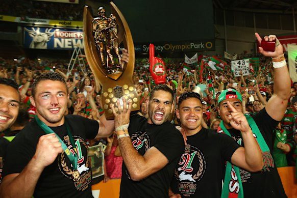 Winning the premiership alongside Sam Burgess and Greg Inglis in 2014.
