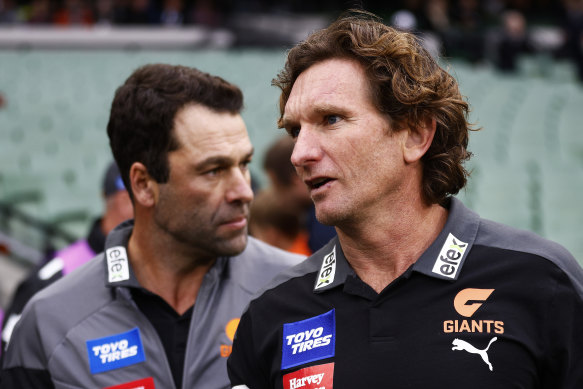 Giants assistant coaches and former Essendon teammates, Dean Solomon and James Hird.