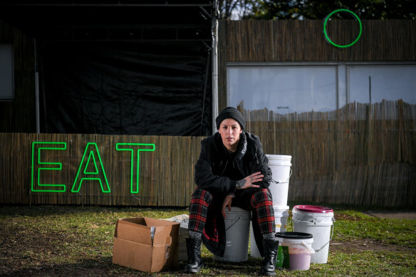 Shannon Martinez, of Smith & Daughters, is pictured at Sidney Myer Music Bowl with stock that will no longer be eaten by Rising festival-goers over the next seven days.