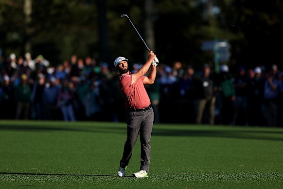 Jon Rahm hits his approach on the 15th. 