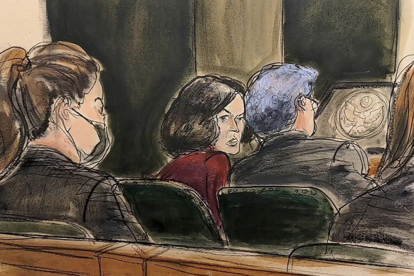 In this courtroom sketch, Ghislaine Maxwell center, confers with her attorney Jeffrey Pagliuca.