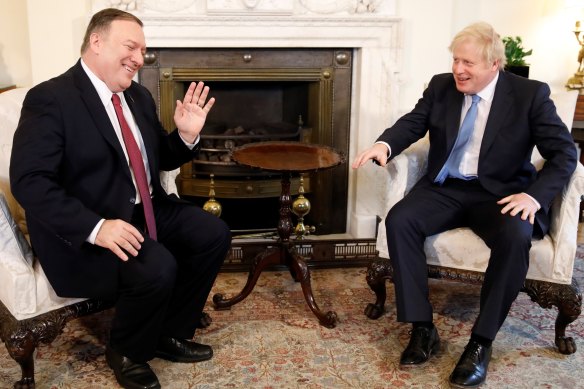 US Secretary of State Mike Pompeo and British Prime Minister Boris Johnson discuss the role of Huawei in British 5G networks at Downing Street on Thursday.