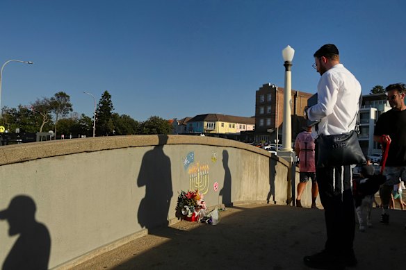Tributes on the pedestrian bridge at Bondi Beach in the days after the December 14 attack.