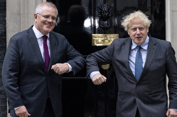 Prime Minister Scott Morrison is greeted by British PM Boris Johnson outside 10 Downing Street, London, on Monday.