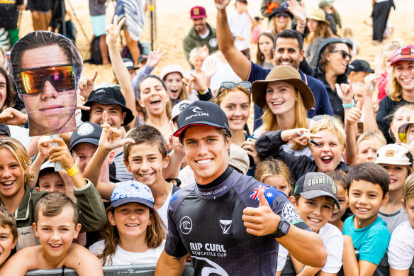 Morgan Cibilic greets his fans after beating two-time WSL Champion John John Florence at Newcastle this year.