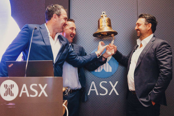 Symal’s Ray Dando, Andrew Fairbairn and Joe Bartolo ring the famed ASX bell. 