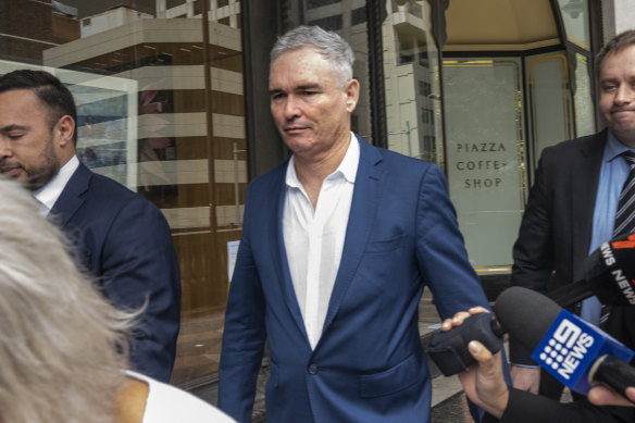 Former federal Labor MP Craig Thomson leaves Downing Centre Local Court after pleading guilty to fraud offences.