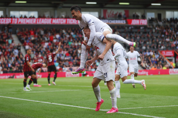 Dejan Kulusevski celebrates Heung-Min Son after scoring a goal against Bournemouth.