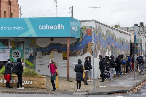 People queue at the Collingwood COVID-19 testing site in May.