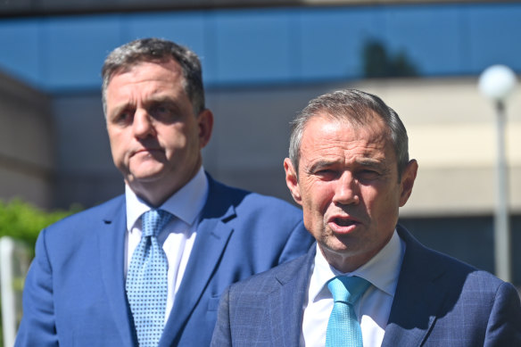 Department of Health Director General David Russell-Weisz and Health Minister Roger Cook. 