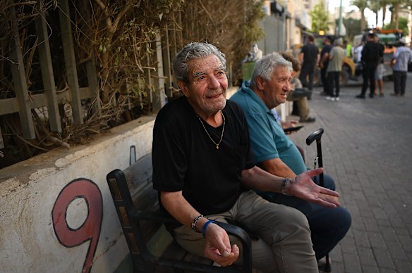 Birsheba resident kasabi (left) a veteran of Yom Kippur War says he wants to see a change in the regime in Iran. I was sitting out of a destroyed building that has been struck by an iranian ballistical missile in beersheba on Tuesday.