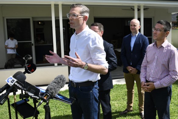 Premier Dominic Perrottet talks up his stamp duty proposal with Treasurer Matt Kean and Kogarah candidate Craig Chung on Sunday.