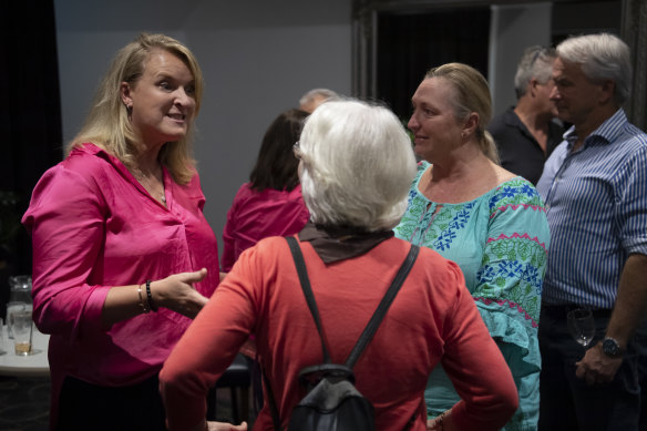 Kylea Tink talks to voters at a function at Northbridge Golf Club.