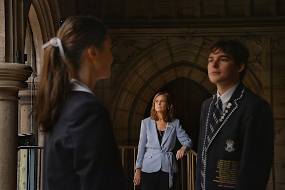 St Andrew’s students are explicitly taught to recognise patterns of coercive control and abuse. Principal Julie McGonigle (centre) with school captains Ruby Buckman and Lachlan Sparshott.