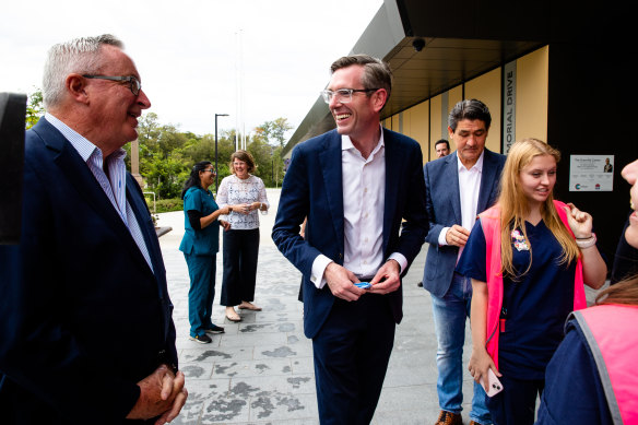 NSW Premier Dominic Perrottet, Minister for Health Brad Hazzard, NSW Health’s Susan Pearce and Parramatta MP Geoff Lee outside the new Granville Centre vaccination clinic on Sunday.