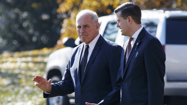 White House Chief of Staff John Kelly, left, and departed staff secretary Rob Porter board Marine One in November. 