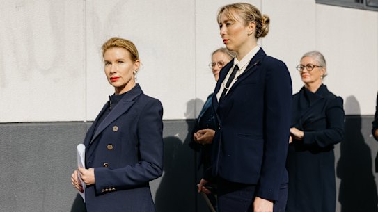 Kirsha Kaechele (left) and supporters arrive for Tuesday’s hearing.