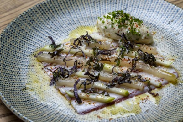 Smoked eel is layered with diagonal strips of crunchy apple and pickled kohlrabi.