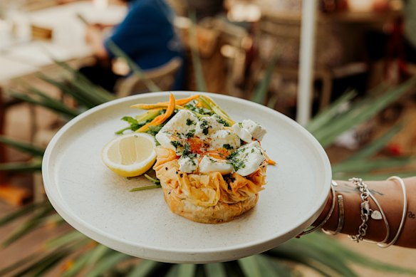 The individual filo pies are topped with a soft-boiled egg. 