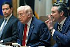 Defence Secretary Pete Hegseth speaks as US President Donald Trump and Secretary of State Marco Rubio listen during a Cabinet meeting at the White House, Thursday, March 26, 2026, in Washington 