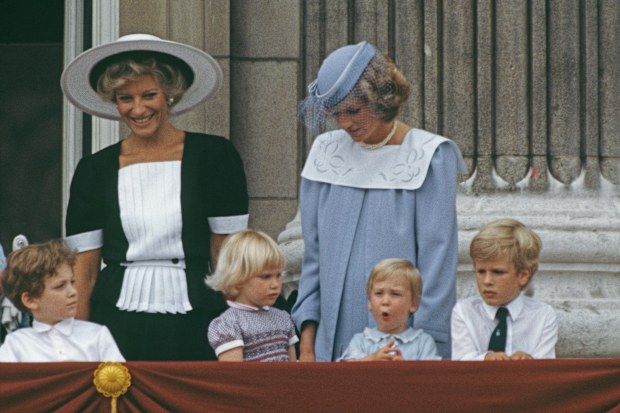 Princess Michael of Kent, Diana, Princess of Wales and Prince William on the balcony of Buckingham Palace in London for the Trooping the Colour ceremony, June 1984. Diana is wearing a dress by Jan Van Velden.