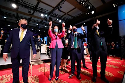 Members of the Brisbane 2032 delegation, from left, John Coates AC, President, Australian Olympic Committee, The Honourable Queensland Premier Annastacia Palaszczuk., Lord Mayor Adrian Schrinner, and Federal Sports and Aged Care Minister Senator Richard Colbeck  celebrate in Tokyo in Julyb 2021 as Queensland is named host state for the 2032 Games.
