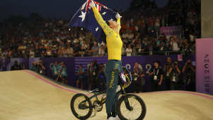Saya Sakakibara of Australia celebrates clinching the gold medal in a BMX racing event.