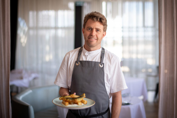 Executive chef Jason Staudt with Stokehouse Pasta &amp; Bar’s popular fish and chips.