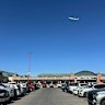 An aircraft flies over El Paso Airport on Wednesday.